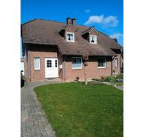 Charmante Doppelhaushälfte in Sonsbeck-Hamb mit großem Grundstück