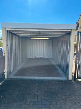 Foto - Garage, Sickenwand-Fertiggarage von Siebau mit Schuppen