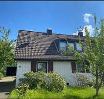 Siedlungshaus mit großem Garten und großer Garage - Krefeld Benrad