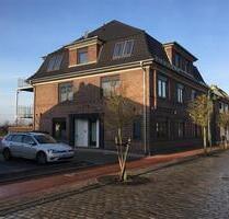 Moderne 2-Zimmer-Erdgeschoss-Wohnung im Herzen von Twistringen, mit Terrasse und Garten-Anteil!