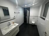 Foto - Modernes Zimmer mit Bad in Ellhofen