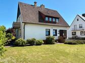 Foto - Hilter 3,5 ZKB Erdgeschoss-Wohnung m.Wintergarten u. Gartenanteil