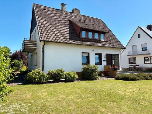 Foto - Hilter 3,5 ZKB Erdgeschoss-Wohnung m.Wintergarten u. Gartenanteil