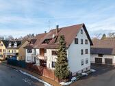 Foto - Familienfreundliche 4-Zimmer-Erdgeschosswohnung mit Terrasse, Gartenanteil und Garage