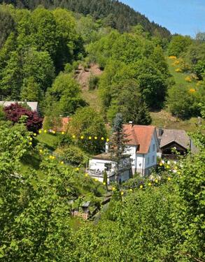 Foto - Einfamilienhaus mit Anbau im Landhausstil und viel Garten