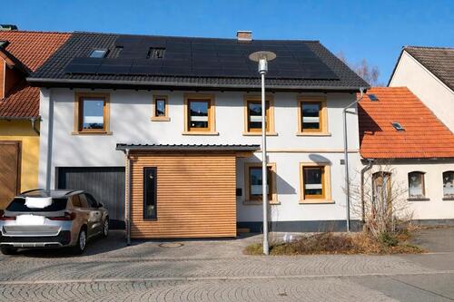 Foto - Modernisiertes Reihenmittelhaus mit PV Anlage, Garage und Garten
