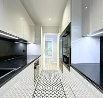 Erstbezug nach Sanierung – Hochwertige 3-Zi.-Wohnung mit exklusiver Einbauküche - Papendorf