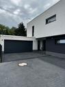 Foto - Einfamilienhaus mit Doppelgarage im Kubusstyle