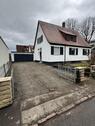 Foto - Einfamilienhaus mit Garten und Garage