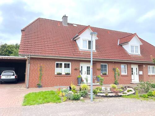 Foto - Wohlfühl-Doppelhaushälfte mit PV-Anlage, Garten & Wellnessbereich