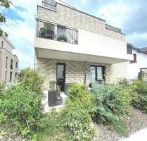 Moderne 2,5-Zimmer-Erdgeschosswohnung mit großer Südterrasse, EBK und TG-Platz in Mainz-Finthen