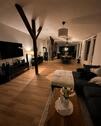 Foto - Loftwohnung mit Haus-gefühl – 127 m², Kamin & Designküche