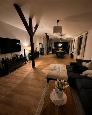Foto - Loftwohnung mit Haus-gefühl – 127 m², Kamin & Designküche