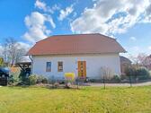 Foto - Modernes Einfamilenhaus + anliegenden Baugrundstück