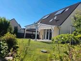 Foto - Doppelhaushälfte mit Garten und Carport