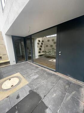 Foto - Helle Souterrain Neubau-Wohnung