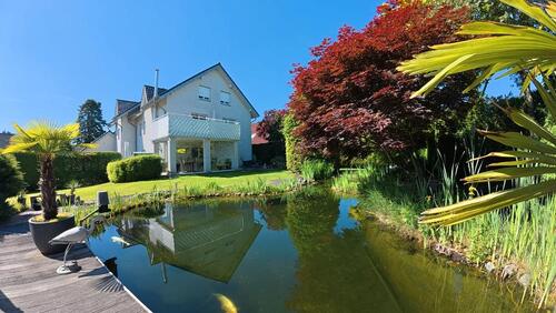 Foto - Gehobene Eigentumswohnung mit. Schwimmteich, Garten, Wintergarten