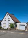 Foto - Einfamilienhaus freistehend mit Garage und Garten