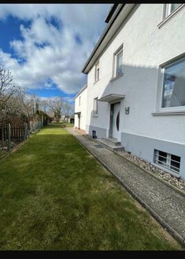 Foto - Mehrfamilienhaus mit Anbau und Garten