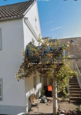 Foto - Großzügiges Zweifamilienhaus mit zusätzlichem Gartenland