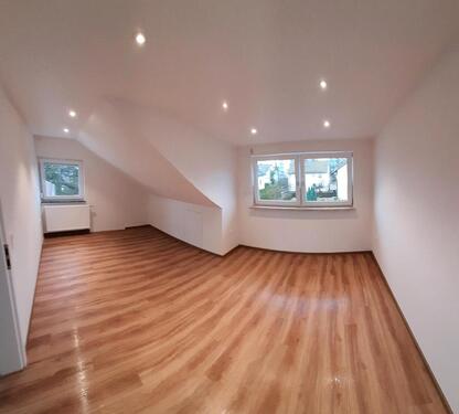 Foto - Moderne Zwei Zimmer-Dachgeschosswohnung