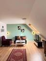 Foto - Nette und lichtdurchflutete Dachgeschosswohnung mit Spitzboden –