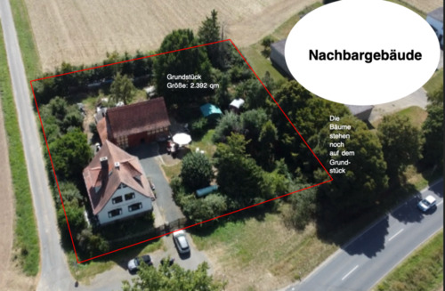 Foto - Freistehendes Einfamilienhaus mit Garten, Scheune und Bauplatz