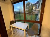 Foto - Großzügige möblierte 1-Zimmerwohnung mit Wintergarten