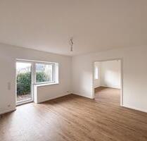 Moderne Hochparterre Terrassenwohnung mit eigenem Garten – Erstbezug nach energet. Sanierung - Groß-Gerau