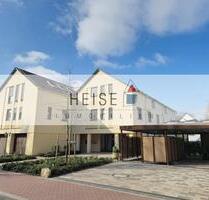 Neubauwohnung mit überdachter Terrasse, Einbauküche und Garage - Holzminden