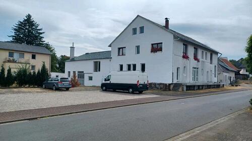 Foto - Mehrfamilienhaus mit Gewerbeflächen -ideal für Bauunternehmen