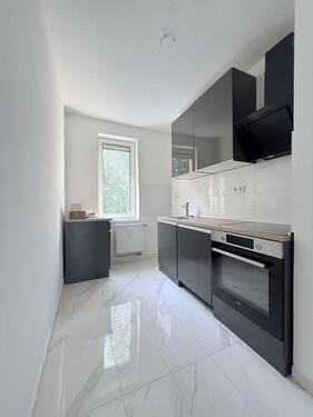 Foto - Helle und moderne 2 Zi. Whg 47Qm Küche Keller