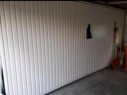 Foto - Hörmann Garagenschwintor elektronisch mit Fernbedienung