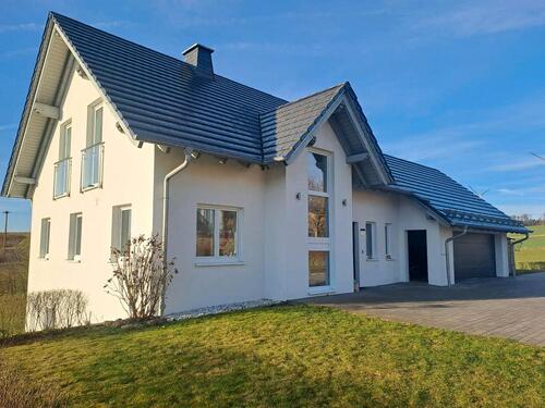 Foto - Hochwertiges Einfamilienhaus in grüner Ortsrandlage zu vermieten