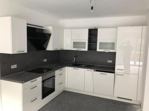 Foto - Moderne 77 m² Wohnung mit Küche, Balkon, Fahrstuhl und Tiefgarage