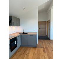 Helle Neubau-Dachgeschosswohnung (KfW-40-Standard) mit Balkon - Iggensbach