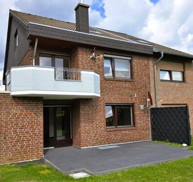Foto - Erdgeschosswohnung mit Südterrasse, Privatgarten & Garage