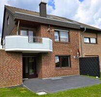 Erdgeschosswohnung mit Südterrasse, Privatgarten & Garage - Eschweiler
