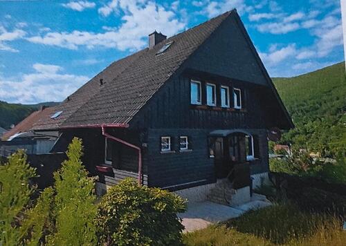 Foto - Doppelhaushälfte im Schwarzwaldstil in NW