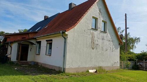 Foto - Sanierungsbedürftige Doppelhaushälfte mit Nebengebäude