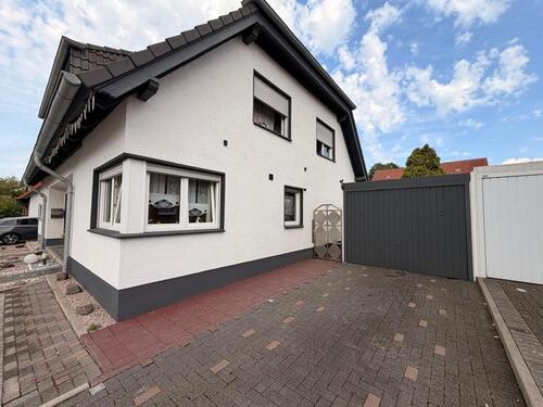 Foto - Doppelhaushälfte mit Garage und Garten