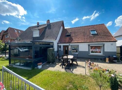 Foto - Einfamilienhaus mit genehmigtem Baugrundstück