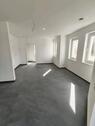 Foto - Neubau Erstbezug EG Wohnungen 65-70qm Tiefgarage, Wallbox, Garten