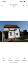 Foto - freistehendes Einfamilienhaus mit kleinen Garten und Nebengelass