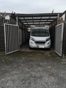 Foto - Carport geschlossen Wohnmobil oder Wohnwagen