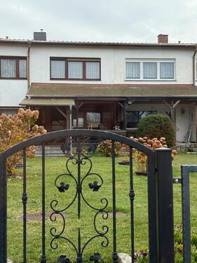 Foto - Familienfreundliches Reihenmittelhaus mit Keller und Nebengebäude