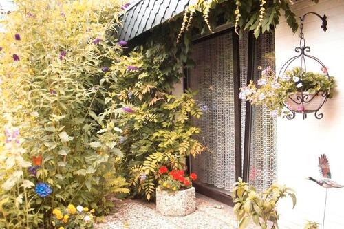 Foto - Großzügiger Winkelbungalow (Satteldach, Fußbodenheizung, Garage)