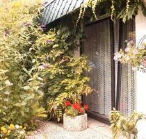 Großzügiger Winkelbungalow (Satteldach, Fußbodenheizung, Garage) - Soltau