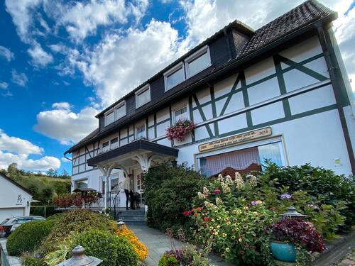 Foto - Wohnhaus mit Ferienwohnungen und Gästezimmern