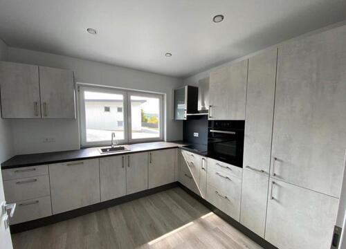 Foto - 2 Zi. Wohnung Neubau 1 OG - Küche - Fußbodenheiz.